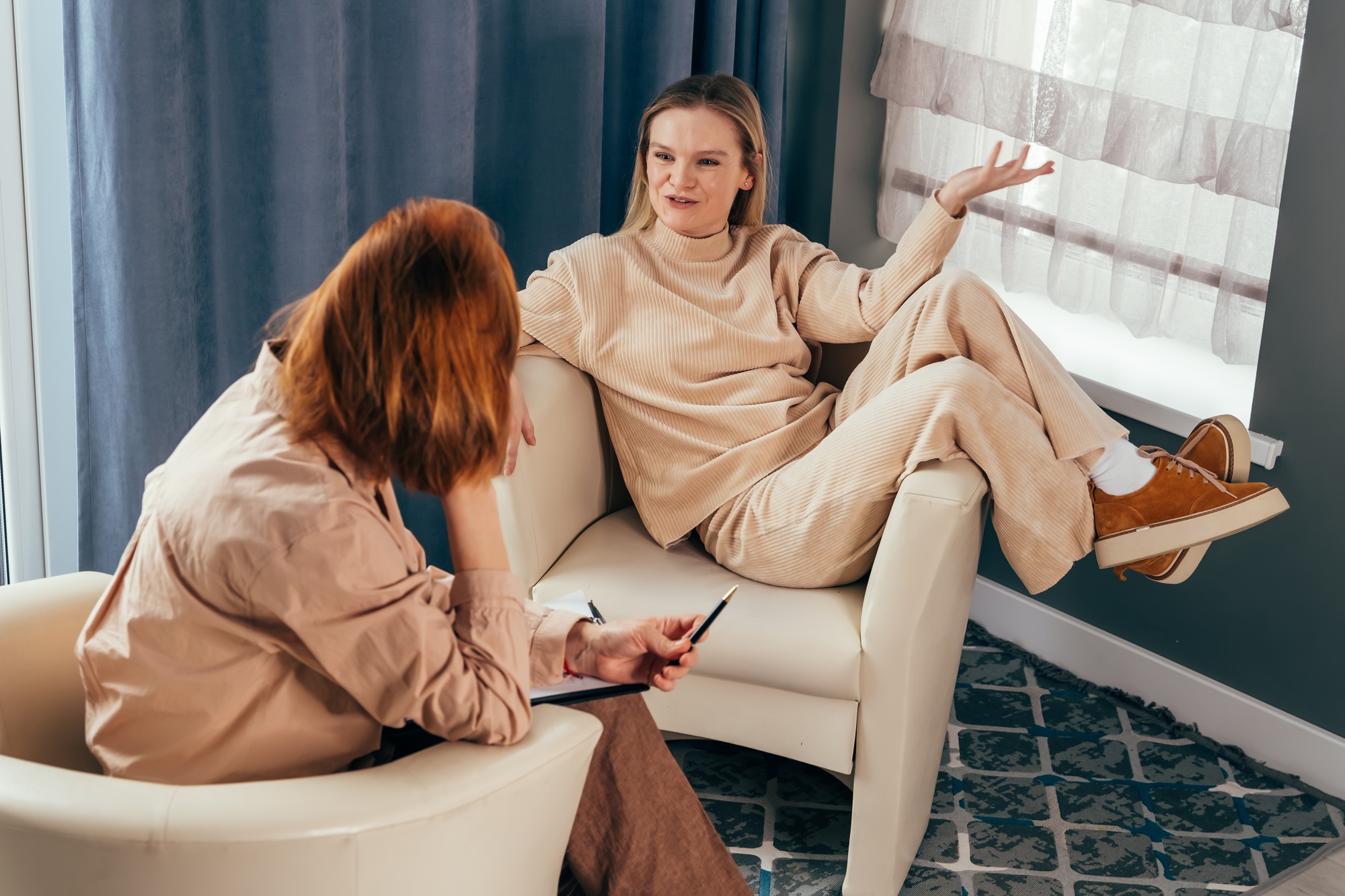 A woman at a consultation with a psychologist.